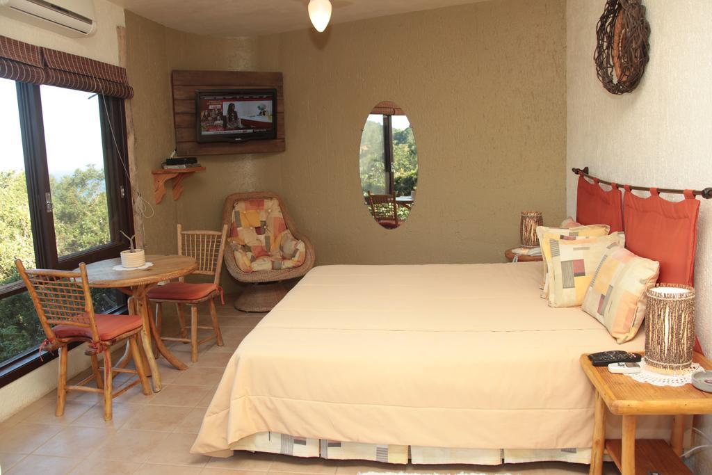 Bangalore Suites Garopaba Rum bild